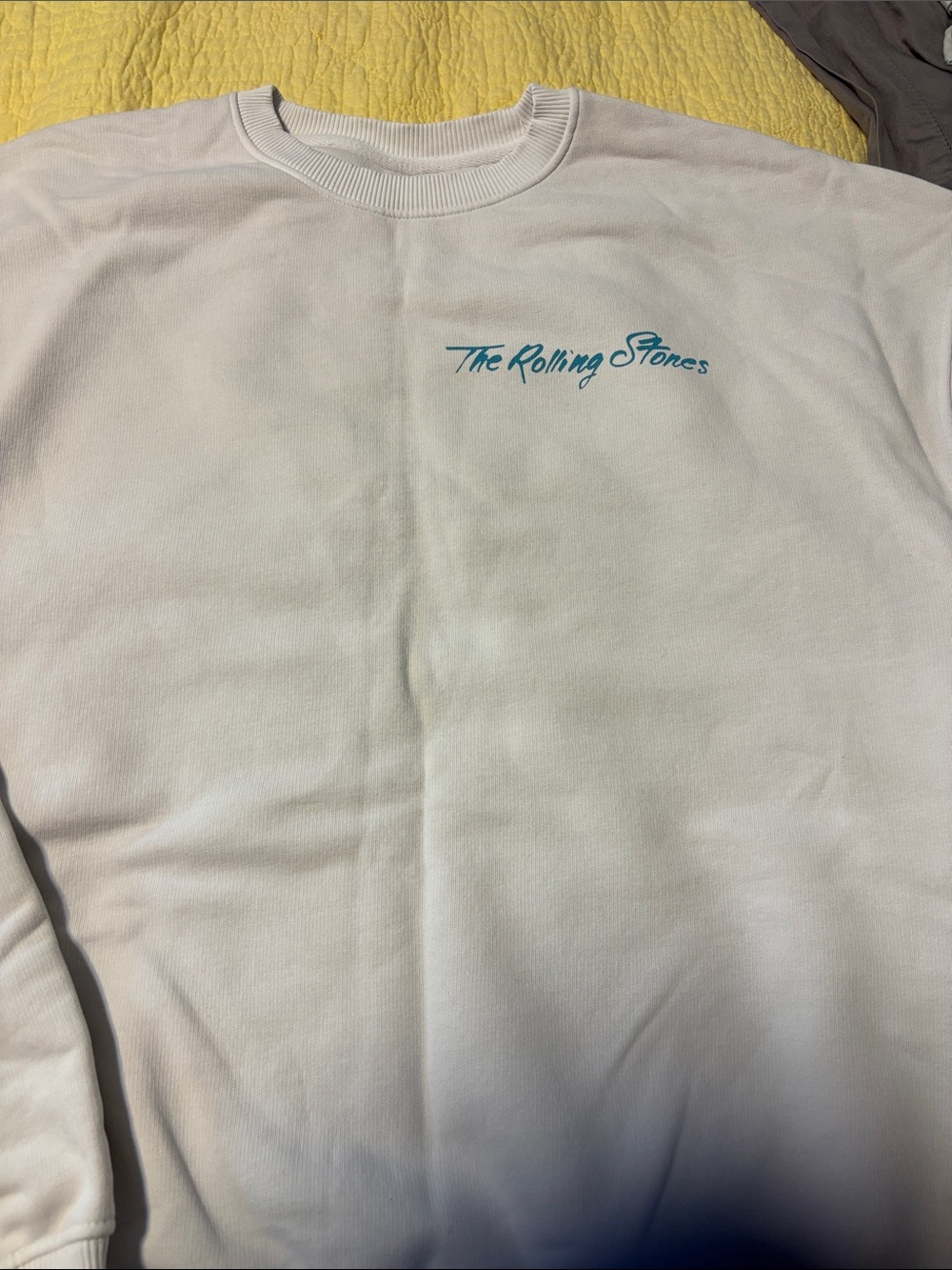 The Rolling Stones White Sweatshirt with Teal Script